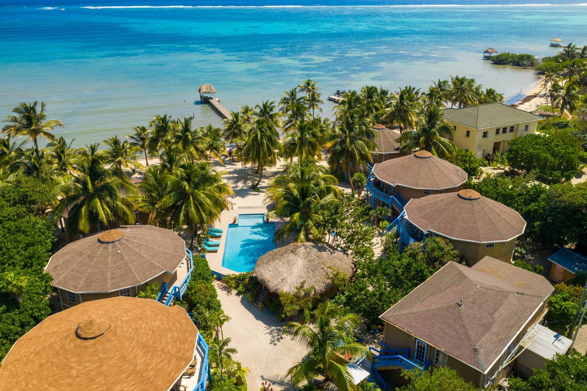 Aerial view of the White Sands Cove beachfront and dock